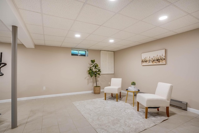 16 Pulpit Run, Amherst, NH 03031 - living area featuring tile patterned floors, baseboard heating, recessed lighting, baseboards, and a drop ceiling