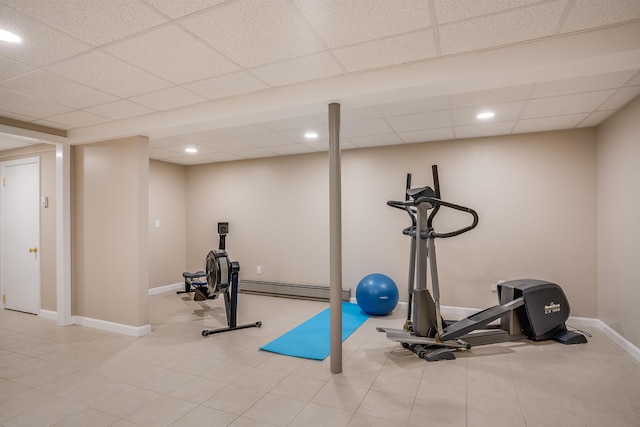 16 Pulpit Run, Amherst, NH 03031 - exercise room with a baseboard radiator, a drop ceiling, baseboards, and recessed lighting