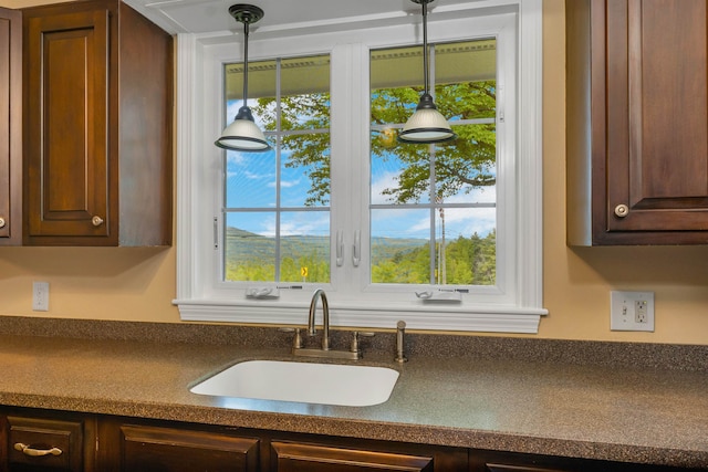 223 Deering Center Rd, Deering, NH 03244 - kitchen featuring dark countertops, a sink, and healthy amount of natural light