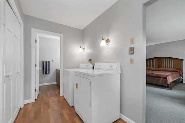 223 Deering Center Rd, Deering, NH 03244 - laundry room featuring separate washer and dryer, baseboards, and light wood-style floors