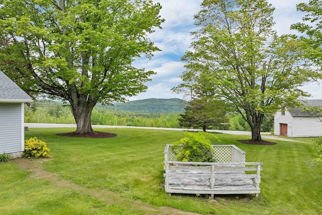 223 Deering Center Rd, Deering, NH 03244 - view of grassy yard featuring a deck with mountain view