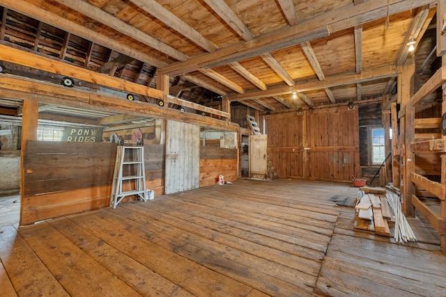 223 Deering Center Rd, Deering, NH 03244 - miscellaneous room with wood walls and hardwood / wood-style floors