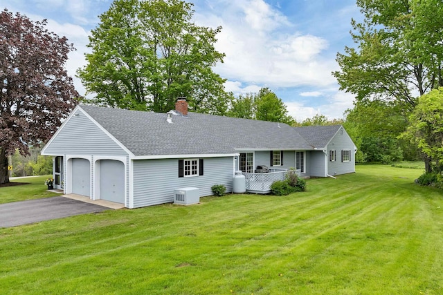 223 Deering Center Rd, Deering, NH 03244 - ranch-style home featuring a chimney, a shingled roof, asphalt driveway, and a front yard