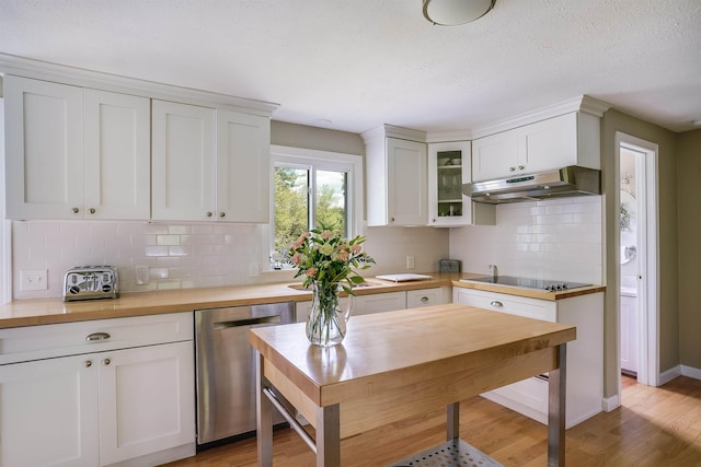 86 Pelham Rd, Salem, NH 03079 - kitchen with under cabinet range hood, stainless steel dishwasher, black electric stovetop, light wood-style flooring, and white cabinets