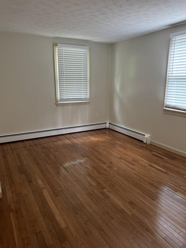 9 Quarry Rd, Hampstead, NH 03841 - spare room featuring dark wood finished floors and a textured ceiling