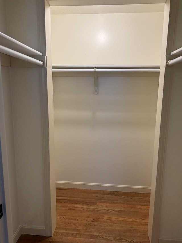 9 Quarry Rd, Hampstead, NH 03841 - walk in closet featuring wood finished floors