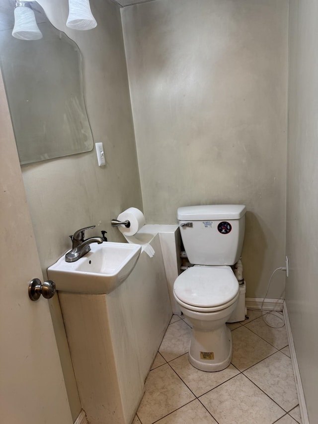 9 Quarry Rd, Hampstead, NH 03841 - half bathroom with toilet, a sink, and tile patterned flooring