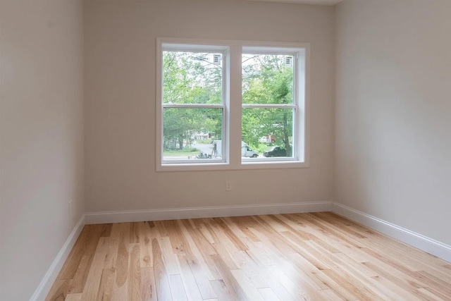 28 Colony Dr, Barnstead, NH 03225 - empty room with plenty of natural light, light wood-type flooring, and baseboards