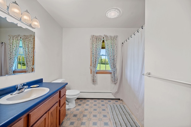 338 Johnson Rd, Marshfield, VT 05658 - full bathroom with a baseboard heating unit, vanity, toilet, and a shower with curtain