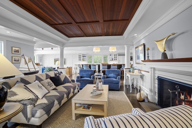 34A Ocean Blvd, North Hampton, NH 03862 - living area featuring ornate columns, crown molding, wood ceiling, wood finished floors, and a fireplace with flush hearth