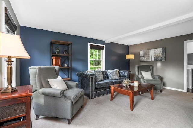 37 Level St, Merrimack, NH 03054 - living room featuring carpet floors, beamed ceiling, and baseboards