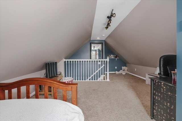 37 Level St, Merrimack, NH 03054 - carpeted bedroom with vaulted ceiling, baseboards, and rail lighting