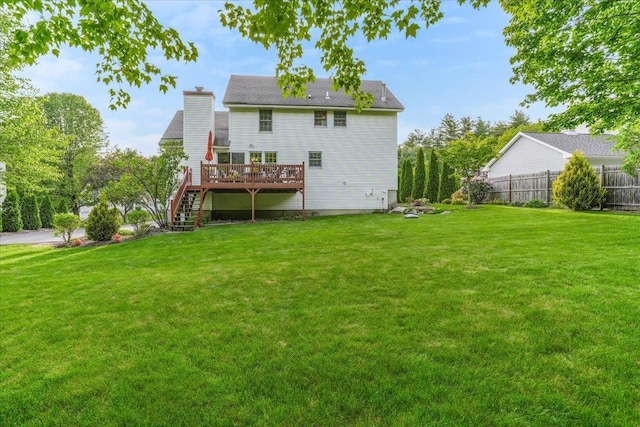 37 Level St, Merrimack, NH 03054 - back of house featuring a deck, a chimney, and stairs