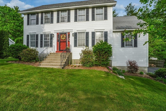 37 Level St, Merrimack, NH 03054 - colonial-style house featuring a front lawn