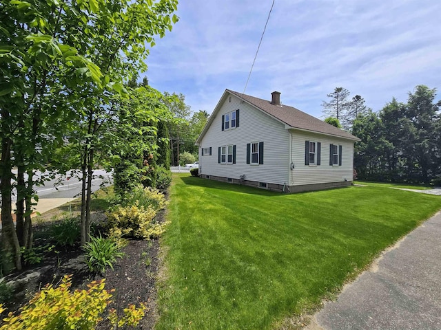 366 S Main St, Concord, NH 03301 - view of side of property featuring a yard, a chimney, and a shingled roof
