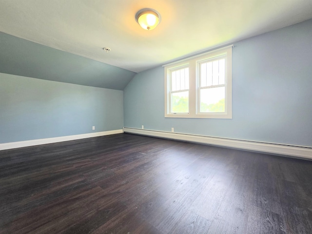 366 S Main St, Concord, NH 03301 - additional living space with baseboard heating, dark wood-style flooring, baseboards, and lofted ceiling