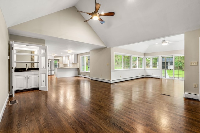 47 Blossom Rd, Windham, NH 03087 - unfurnished living room with a ceiling fan, healthy amount of natural light, high vaulted ceiling, a baseboard heating unit, and dark wood-style floors
