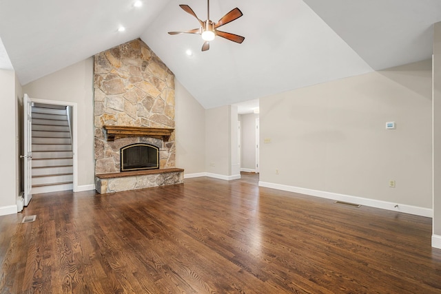 47 Blossom Rd, Windham, NH 03087 - unfurnished living room with ceiling fan, wood finished floors, a stone fireplace, stairway, and baseboards