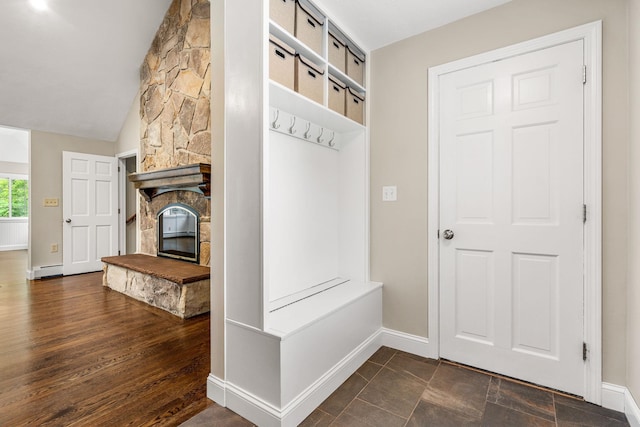 47 Blossom Rd, Windham, NH 03087 - mudroom featuring baseboards, a baseboard radiator, a fireplace, and vaulted ceiling