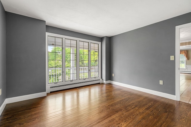 47 Blossom Rd, Windham, NH 03087 - unfurnished room featuring wood finished floors, baseboards, and a baseboard heating unit