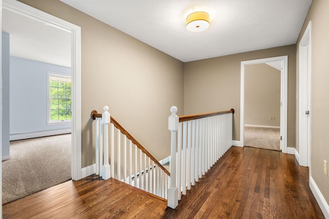 47 Blossom Rd, Windham, NH 03087 - hall with an upstairs landing, a baseboard radiator, wood finished floors, and baseboards