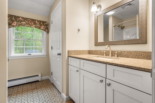 47 Blossom Rd, Windham, NH 03087 - full bath with baseboard heating, vanity, baseboards, and a shower