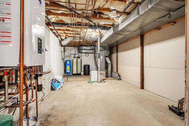 47 Blossom Rd, Windham, NH 03087 - unfinished basement featuring tankless water heater, heating unit, a water softener, and a water pressure tank