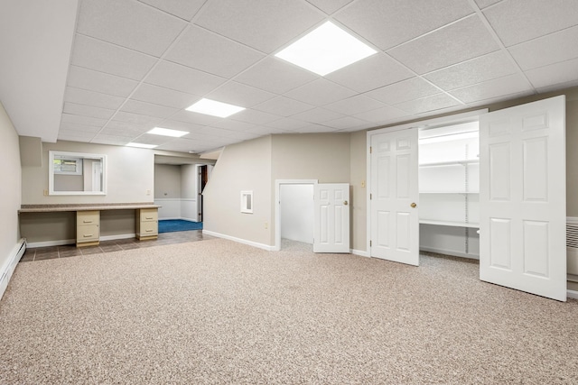47 Blossom Rd, Windham, NH 03087 - basement featuring carpet floors, a drop ceiling, and baseboards