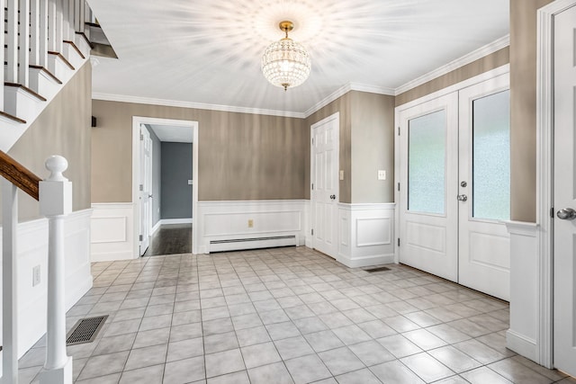 47 Blossom Rd, Windham, NH 03087 - entryway with a baseboard radiator, a chandelier, stairs, crown molding, and tile patterned floors