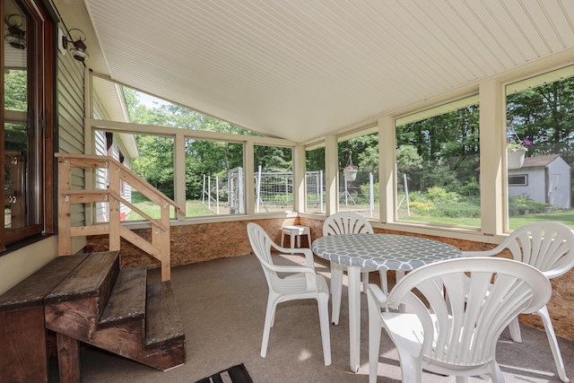 144 Whitten Rd, Milford, NH 03055 - sunroom / solarium with lofted ceiling and carpet flooring