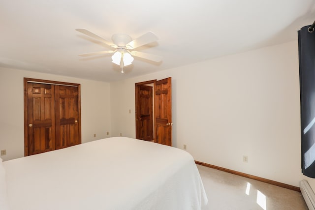 144 Whitten Rd, Milford, NH 03055 - bedroom featuring light colored carpet, baseboard heating, baseboards, and a ceiling fan