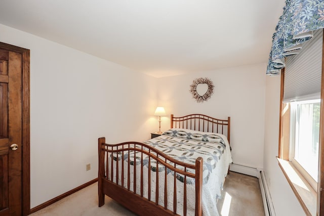 144 Whitten Rd, Milford, NH 03055 - bedroom featuring light colored carpet, baseboards, and baseboard heating