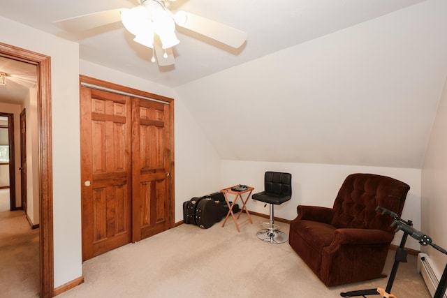 144 Whitten Rd, Milford, NH 03055 - living area with light colored carpet, vaulted ceiling, a baseboard heating unit, a ceiling fan, and baseboards