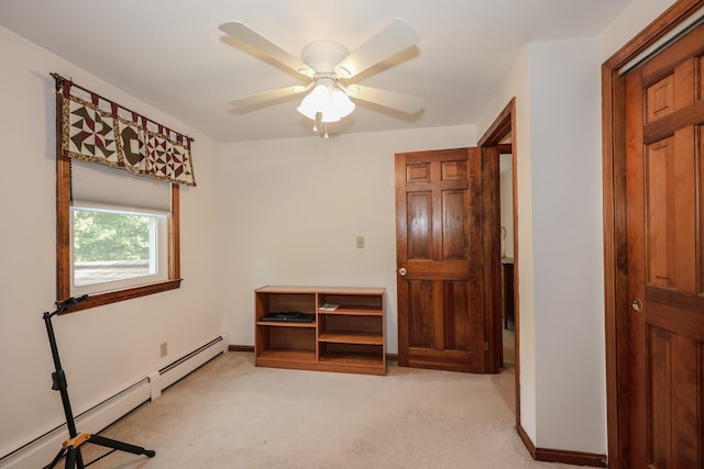 144 Whitten Rd, Milford, NH 03055 - bedroom with a baseboard radiator, light carpet, baseboards, and a ceiling fan