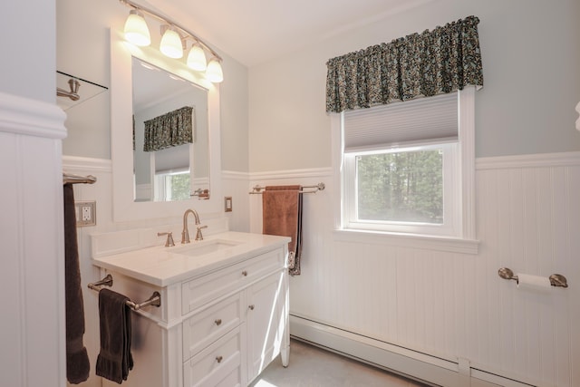 144 Whitten Rd, Milford, NH 03055 - bathroom with wainscoting, vanity, and baseboard heating