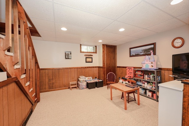 144 Whitten Rd, Milford, NH 03055 - living area featuring a wainscoted wall, carpet, recessed lighting, a drop ceiling, and stairway