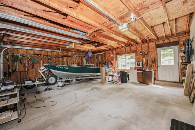 144 Whitten Rd, Milford, NH 03055 - garage featuring a workshop area