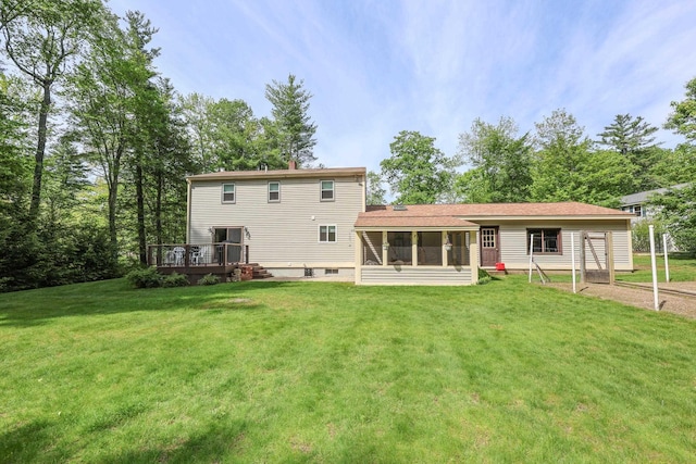 144 Whitten Rd, Milford, NH 03055 - rear view of property with a sunroom, a wooden deck, and a lawn