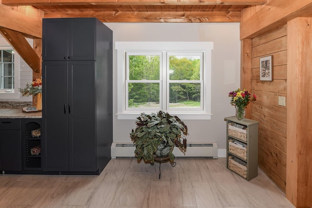 689 Hard Scrabble Rd, Sweden, ME 04008 - living area with a baseboard heating unit and wood ceiling with exposed beams
