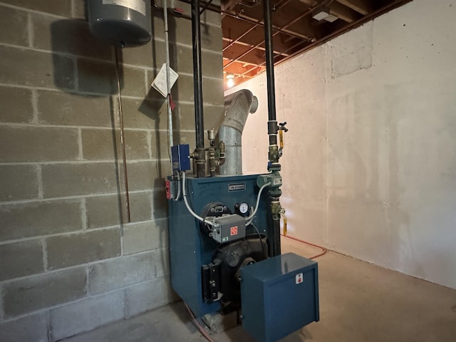 689 Hard Scrabble Rd, Sweden, ME 04008 - utility room featuring a heating unit