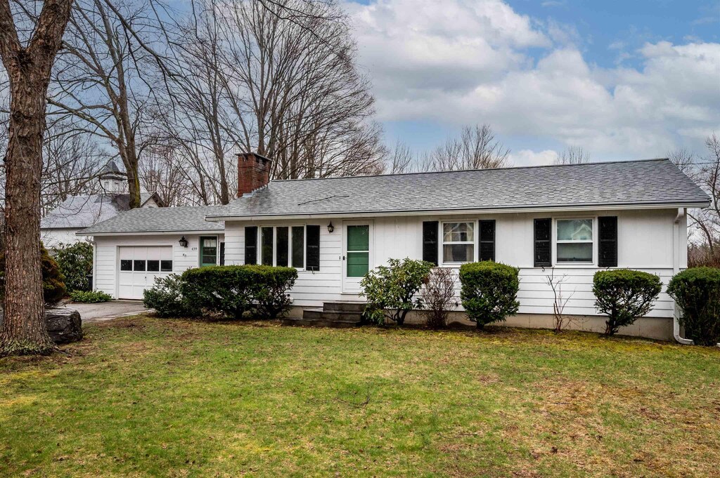 639 Silver St, Rollinsford, NH 03869 - ranch-style house featuring an attached garage, a chimney, driveway, and a front lawn