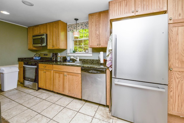 31 Main St, Sandown, NH 03873 - kitchen featuring stainless steel appliances, a sink, pendant lighting, dark stone counters, and ornamental molding