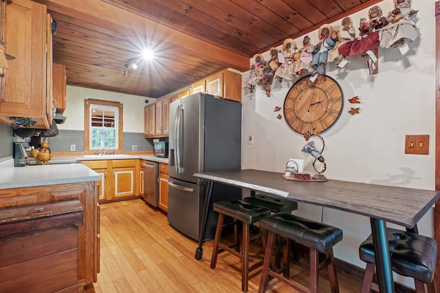 72 Beaver Rd, Strafford, NH 03884 - kitchen featuring appliances with stainless steel finishes, wood ceiling, light wood-style flooring, a sink, and light countertops
