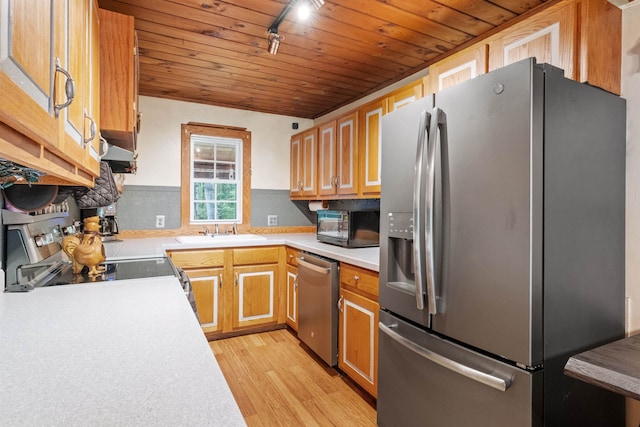 72 Beaver Rd, Strafford, NH 03884 - kitchen featuring stainless steel appliances, wood ceiling, a sink, track lighting, and light wood finished floors
