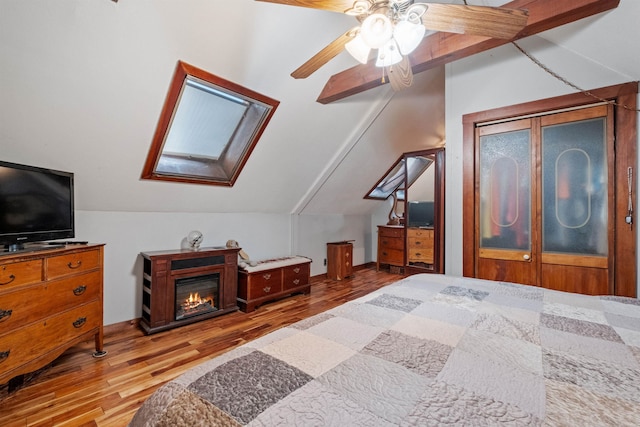 72 Beaver Rd, Strafford, NH 03884 - bedroom with a skylight, wood finished floors, vaulted ceiling, and a ceiling fan