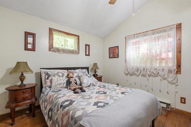 72 Beaver Rd, Strafford, NH 03884 - bedroom featuring wood finished floors, lofted ceiling, a baseboard heating unit, a ceiling fan, and baseboards