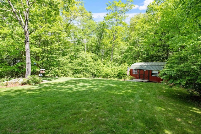 72 Beaver Rd, Strafford, NH 03884 - view of grassy yard with a wooded view