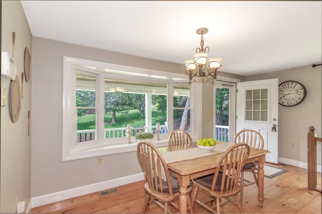 19 Cambridge Rd, Hampstead, NH 03841 - dining area with baseboards, plenty of natural light, and light wood-style flooring