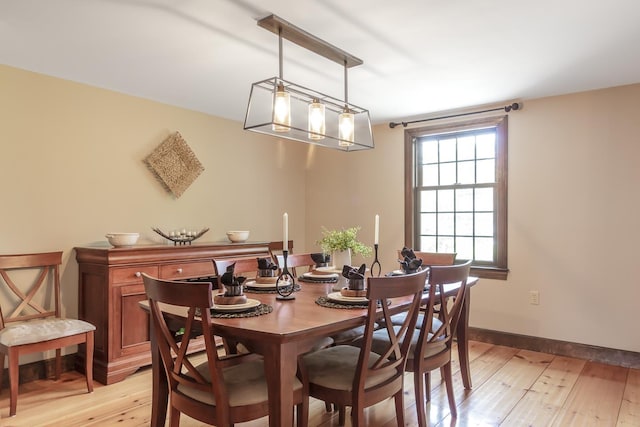 19 Cambridge Rd, Hampstead, NH 03841 - dining room with light wood finished floors and baseboards