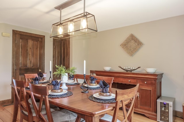 19 Cambridge Rd, Hampstead, NH 03841 - dining room with a chandelier and baseboards